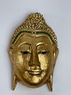Buddha ansigt af træ, guldbemalet med glasflusser, slutningen af det 20. århundrede